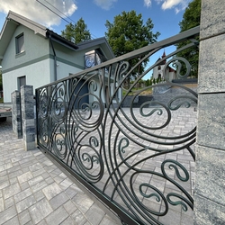 Designer sliding gate  modern fencing for a family house