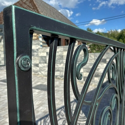 Wrought iron gate with the UKOVMI seal in black color with green patina Wrought iron gate with the UKOVMI seal in black color with green patina