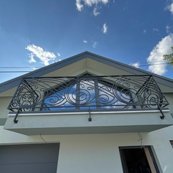 Modern balcony railing made according to the design by Ing. arch. Jozef Figlár Modern balcony railing made according to the design by Ing. arch. Jozef Figlár
